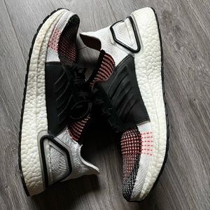 Ultraboost 19 in solar orange. Size 10.5 US